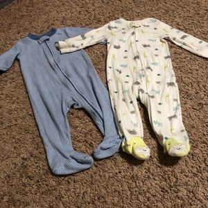 Set of two 9 mo Carter’s footie pajamas 🐱🦒🦛🐘
